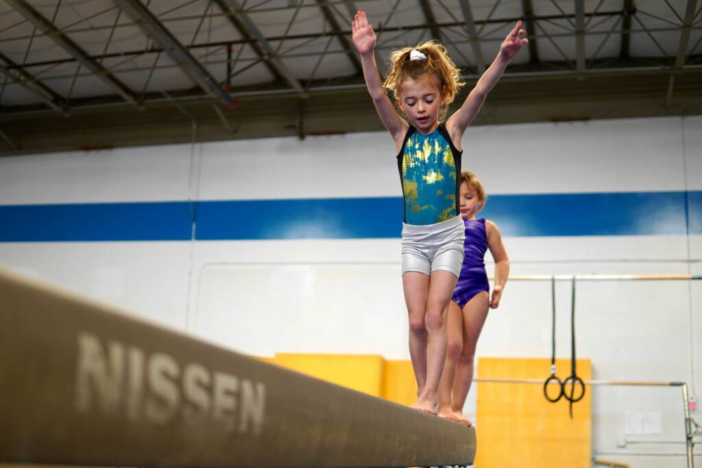 Children practice gymnastics for kids in Dubai at Larsson International Sport Academy with certified coaches.